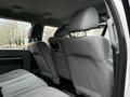 Interior view of the back seats in a 2016 Ford F-550 Super Duty with gray upholstery and headrests visible