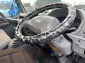 Interior view of a 2005 Toyota Toyoace focusing on a steering wheel decorated with a black and white marbled cover