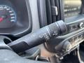 A close-up of a 2017 Chevrolet Colorado windshield wiper control lever featuring settings for off low high and intermittent