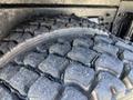 Close-up of a worn tire tread on a 2008 International 7500 showing distinct pattern and grooves