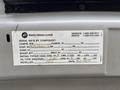 Label on a 2014 Ford E-350 displaying service and parts information including serial numbers and maintenance details