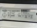 A 2022 Lion Lion6 vehicle identification label featuring specifications and manufacturing details including weight and body information