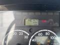 The image shows the dashboard of a 2010 Freightliner M2 106 displaying a digital hour meter reading 146 14.7 hours with engine warning light illuminated