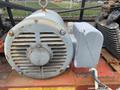 A Baldor Air motor with a gray casing and a round front featuring slotted ventilation grilles