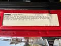 Label of a 1999 Freightliner FL80 detailing vehicle emission compliance and regulations by Freightliner Corporation