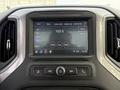 Dashboard display of a 2024 Chevrolet Silverado 1500 showing radio controls and settings