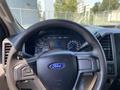 Steering wheel of a 2017 Ford F-250 SD with dashboard controls and gauges visible in front of the driver