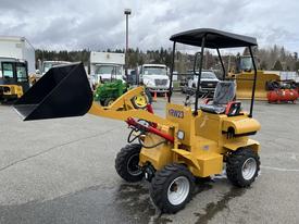 A yellow 2024 AGT Industrial KRW23 Mini Loader with a black bucket attachment and four wheels is shown in the foreground