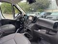 Interior of a 2023 RAM Promaster 3500 featuring a driver's seat steering wheel dashboard and center console with various controls and a display screen