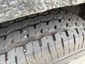Close-up of a tire from a 2025 Shuttle Office showing tread patterns and wear signs