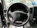 2017 Mercedes-Benz Sprinter steering wheel with a central logo and dashboard instruments visible behind it