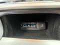 A close-up view of the interior dashboard of a 2019 Jeep Grand Cherokee showing two USB ports and a 12V DC power outlet