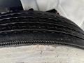 Close-up of a tire from a 2020 International MV607 showcasing its tread pattern and sidewall design
