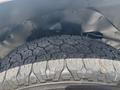Close-up of a treaded tire from a 2020 Chevrolet Express showing detailed patterns and texture
