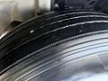 Close-up of a tire from a 2015 Hino 358 showcasing the tread pattern and rubber surface