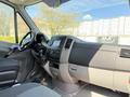 Interior of a 2016 Mercedes-Benz Sprinter showing the steering wheel dashboard and gear shift