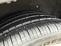 Close-up of the tire on a 2016 Mercedes-Benz GLA-250 showing tread pattern and surface details
