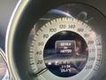 Speedometer display of a 2013 Mercedes-Benz C-Class showing 5215.6 km and 147720 total kilometers with digital clock and temperature readout