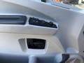 Interior door control panel of a 2022 Lion Lion6 with buttons for windows and locks