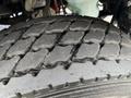 Close-up of a 2015 Freightliner M2 tire showing the tread pattern with visible grooves and texture