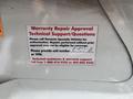 2020 Chevrolet Express with a warranty repair approval notice attached to the vehicle