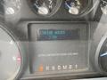The dashboard of a 2015 Ford F-550 showing gauges for turbo boost and engine hours with a display reading 7103 and a label for ultra low sulfur diesel fuel only