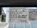 Annual vehicle inspection label for a 2019 Freightliner M2 106 showing details like month year and vehicle identification information