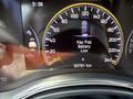 Dashboard of a 2015 Jeep Grand Cherokee displaying a speedometer and warning for low key fob battery with current mileage of 90781 km