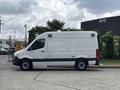 A 2020 Mercedes-Benz Sprinter 2500 van with a white exterior and black accents parked on a concrete surface