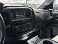 Interior view of a 2020 Chevrolet Silverado dashboard featuring a touchscreen display climate controls and audio system