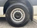 A close-up view of a 2020 Mercedes-Benz Sprinter 2500 wheel featuring a silver hubcap with a Mercedes logo and a black tire with tread markings