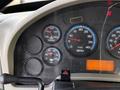 Dashboard of a 2012 International DuraStar 4300 showing gauges for RPM water temperature and oil pressure along with an odometer reading of 84112 miles
