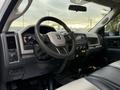 Interior view of a 2012 Dodge Ram 4500 featuring a steering wheel dashboard and center console with various controls and displays