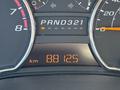 2011 Chevrolet Colorado dashboard displaying the odometer reading of 88125 kilometers and gear shift indicator