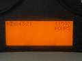 Display panel of a 2011 International 7500 showing the reading 49321 and total hours 11557
