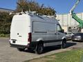 A 2024 Mercedes-Benz Sprinter 2500 van with a white exterior and roof-mounted equipment visible on top