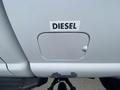 The image shows a white 2016 Ford F-350 SD with a diesel fuel door clearly marked with a "DIESEL" sticker