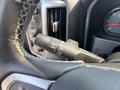 Close-up of the windshield wiper control stalk in a 2017 Chevrolet Silverado 1500 showing settings for front wipers and intermittent wipers