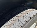 A close-up view of the tire tread on a 2019 Freightliner MT45 showing distinct grooves and texture on the surface