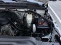 Close-up view of the engine compartment of a 2017 GMC Sierra 3500HD showcasing the engine components and accessories