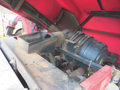 A 2013 Toro Grounds Master 5910 with its engine compartment open showing the air filter housing and engine components