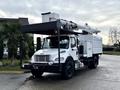 A 2015 Freightliner M2 bucket truck with a white body and an extendable boom mounted on top for aerial work