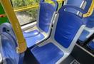 Interior seats of a 2017 Grande West Vicinity bus with blue plastic seats arranged in a row