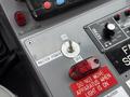 Control panel featuring a master power switch with 'ON' and 'OFF' labels a red warning light and operational instructions