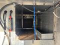 Interior view of a 2006 Freightliner M2 106 showing a large empty cargo space with metal walls and floor