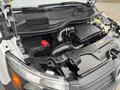 Detailed view of the engine compartment of a 2021 Mercedes-Benz Metris featuring various components like the battery and air intake system