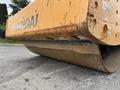 A 2020 Hyundai HR110C road roller with a large cylindrical drum and bright yellow exterior showcasing wear and paint scuffs