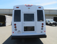 A white 2020 Chevrolet Express with a rear door and wheelchair access features taillights and a smooth surface design
