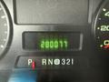 Odometer reading of a 2006 Ford F-450 displaying 200877 miles with gear selector showing P R N D 3 2 1