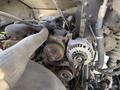 View of the engine compartment in a 2017 Freightliner MT45 showing belts and alternator components
